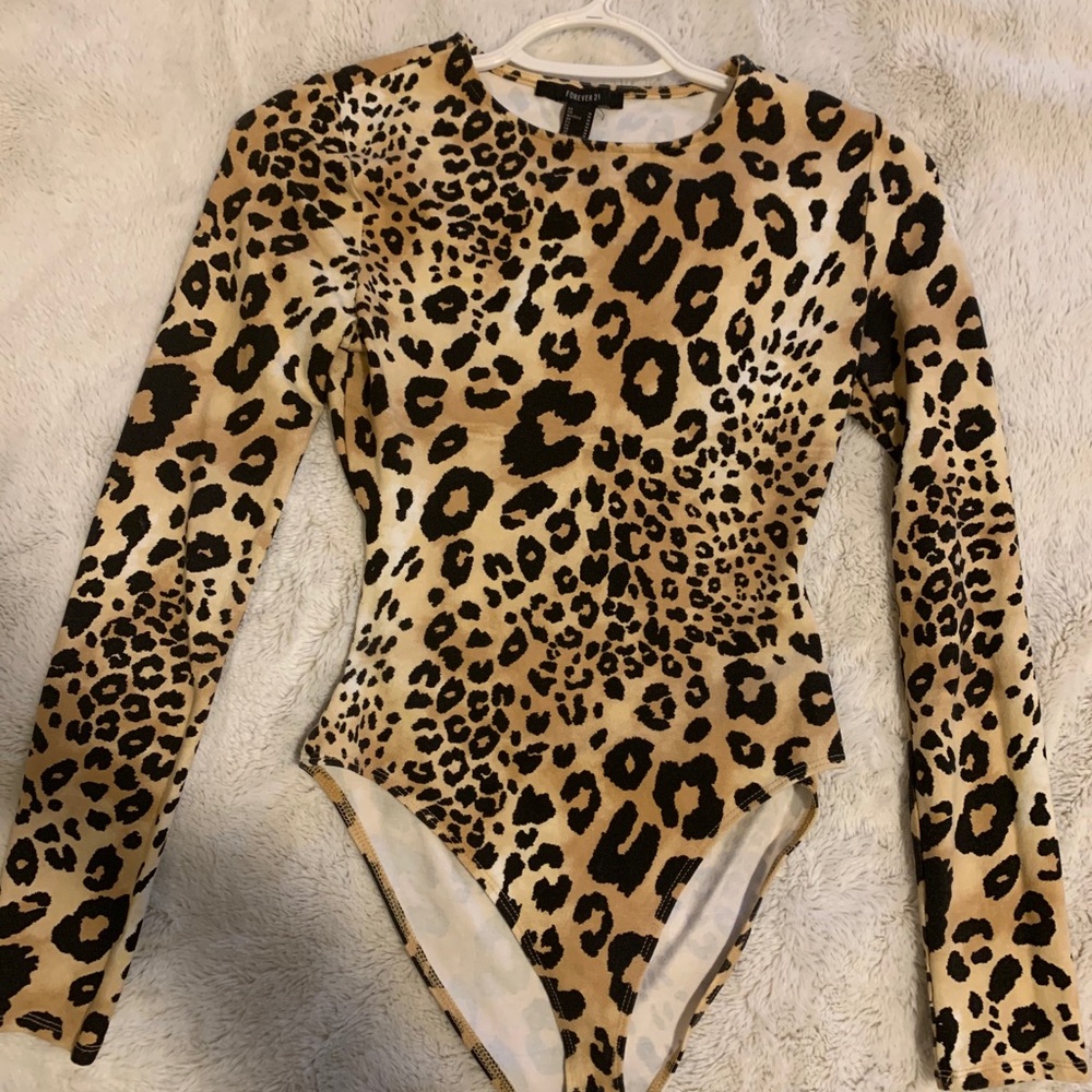 Cheetah print long sleeve body suit with open back